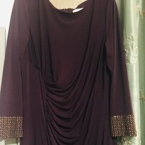 Beautiful eggplant color long formal gown with gold bling cuffs. Size 20W